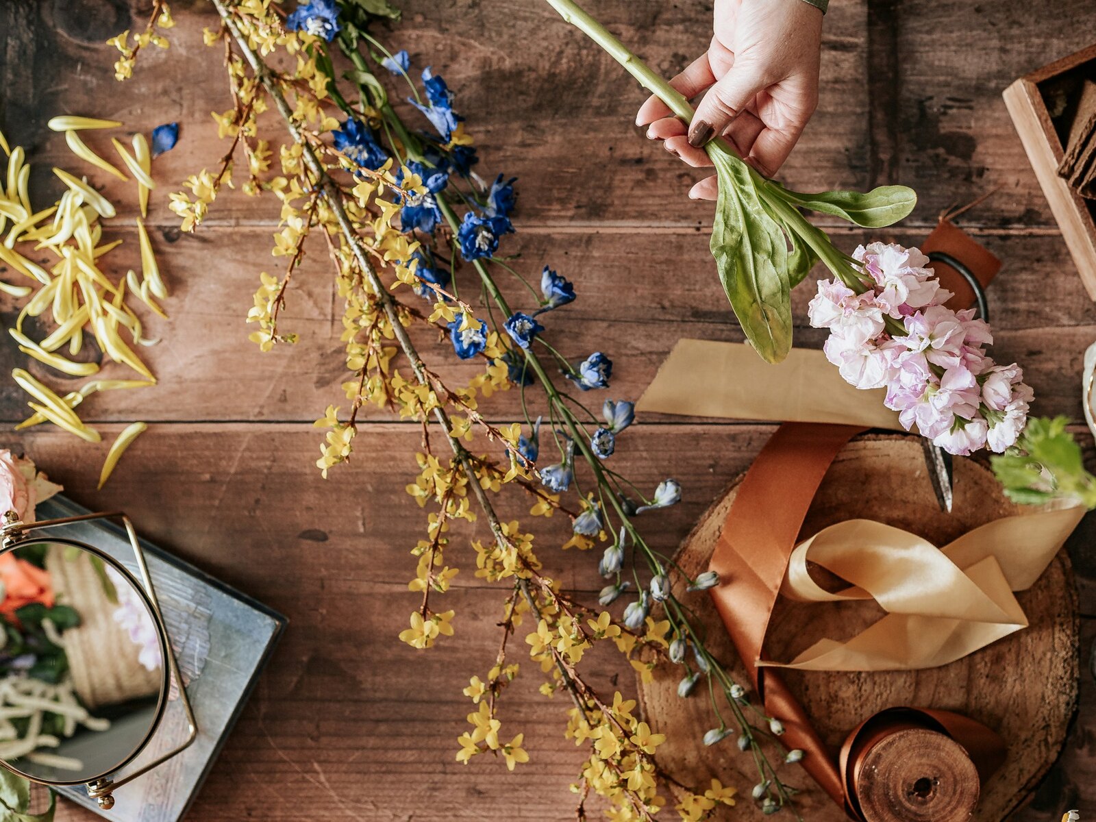 Florist hands arranging a bouquet